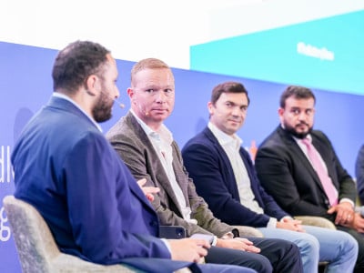 Panel of speakers at a conference